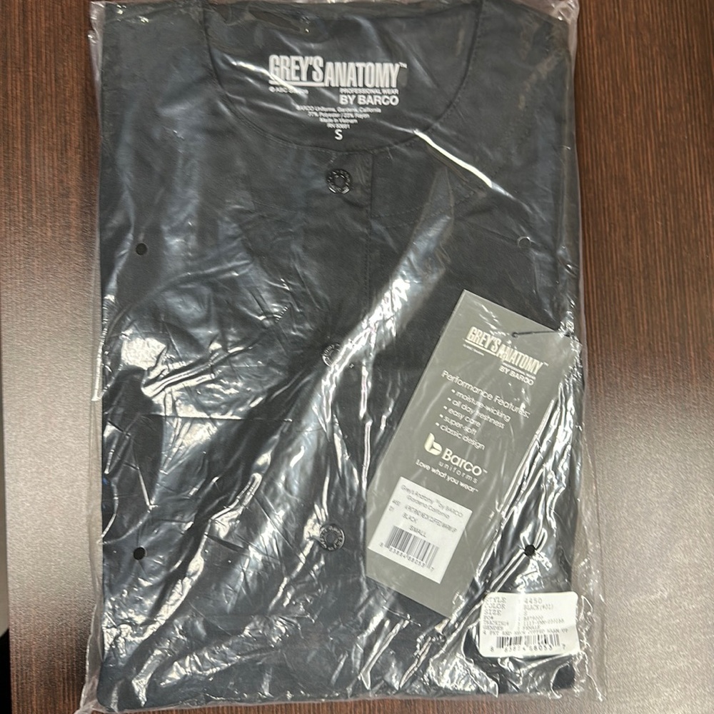 NEW NWT Grey’s Anatomy Scrub Jacket Lab Coat Warm Up Small. Still in package.